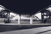 Empty city scape under a bridge in black and white 