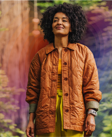 Woman standing with colorful background
