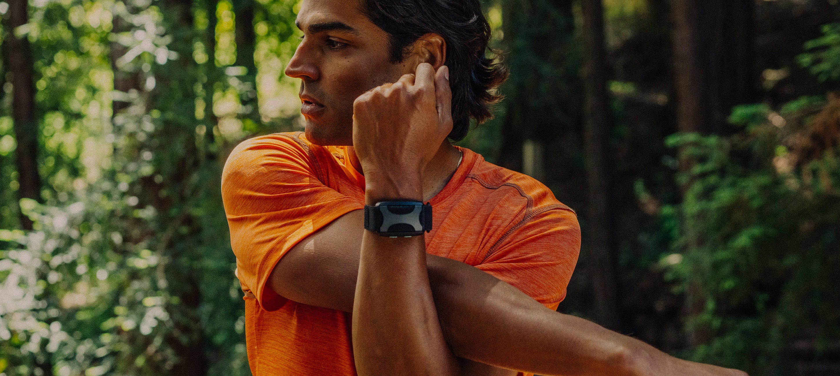 adult male stretching with apollo wearable