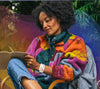 Women sitting writing in journal in front of tree wearing coloring fleece jacket with an Apollo wearable on her left wrist