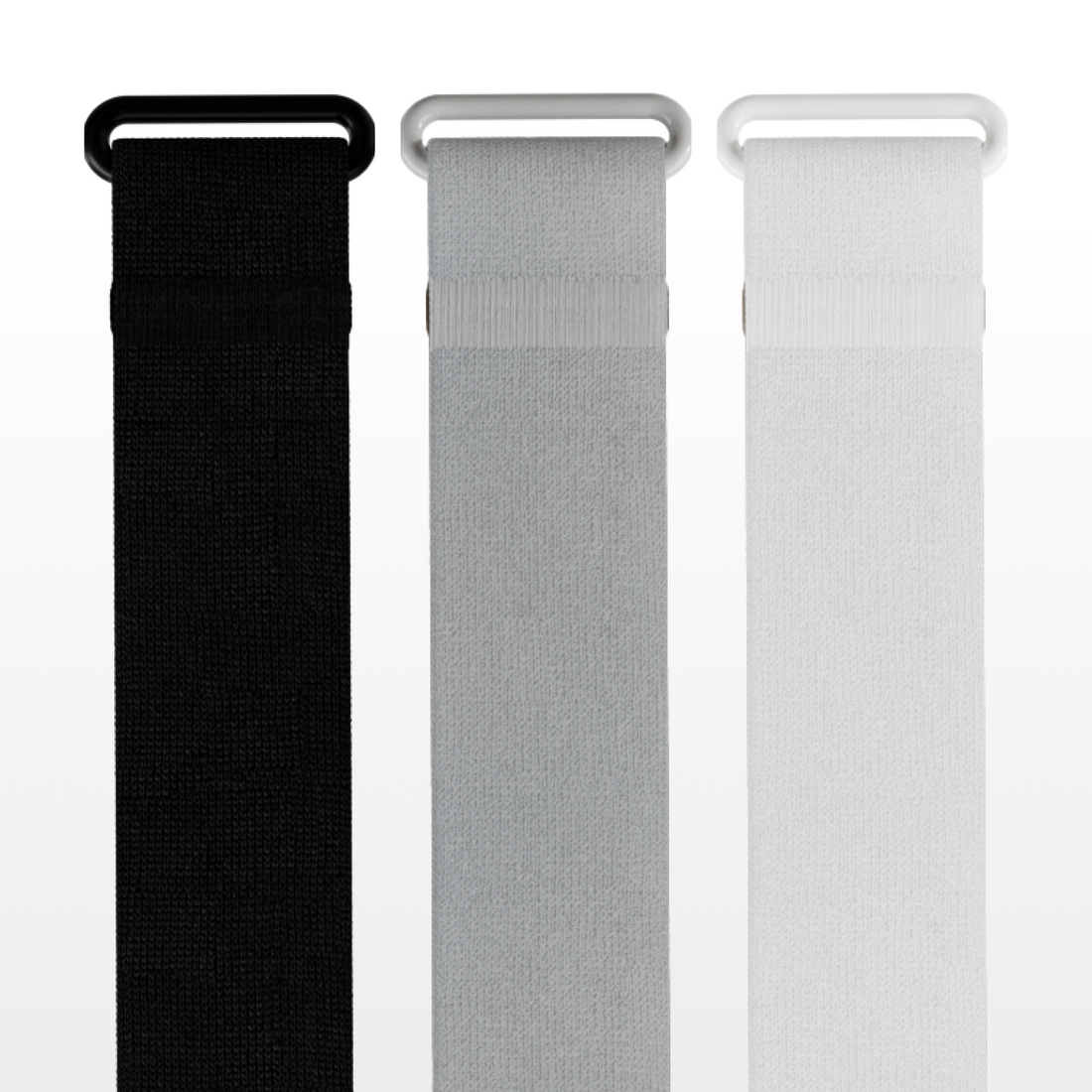 Black, gray, and white watch bands on a white background