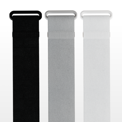 Black, gray, and white watch bands on a white background