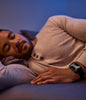 Man sleeping with Stealth Apollo on his wrist