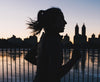 Woman running in the city during early morning